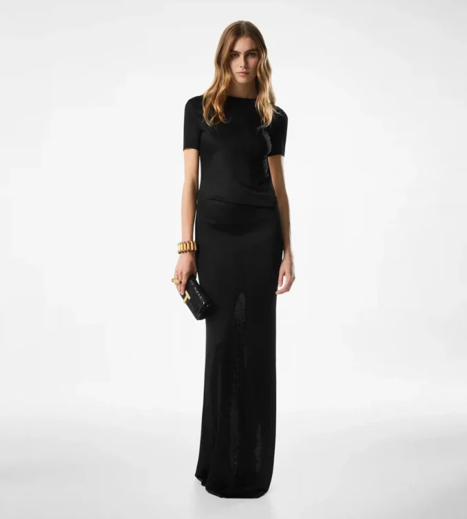 Abito lungo con cut-out e chiusura a catena Abito lungo con cut-out e chiusura a catena