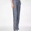 Pantaloni in georgette di seta ricamati con paillettes Pantaloni in georgette di seta ricamati con paillettes