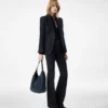 Pantaloni sartoriali svasati in denim