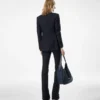 Pantaloni sartoriali svasati in denim