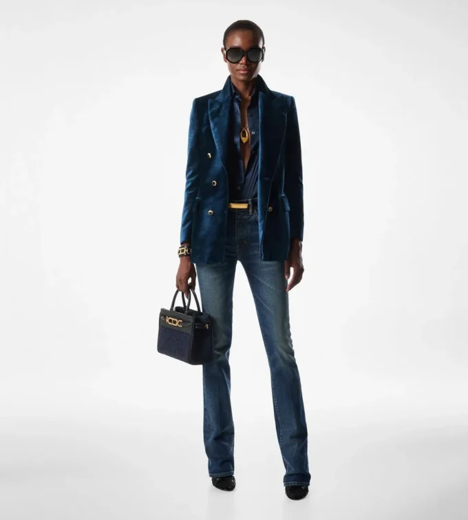 Pantaloni svasati in denim grezzo elasticizzato Pantaloni svasati in denim grezzo elasticizzato
