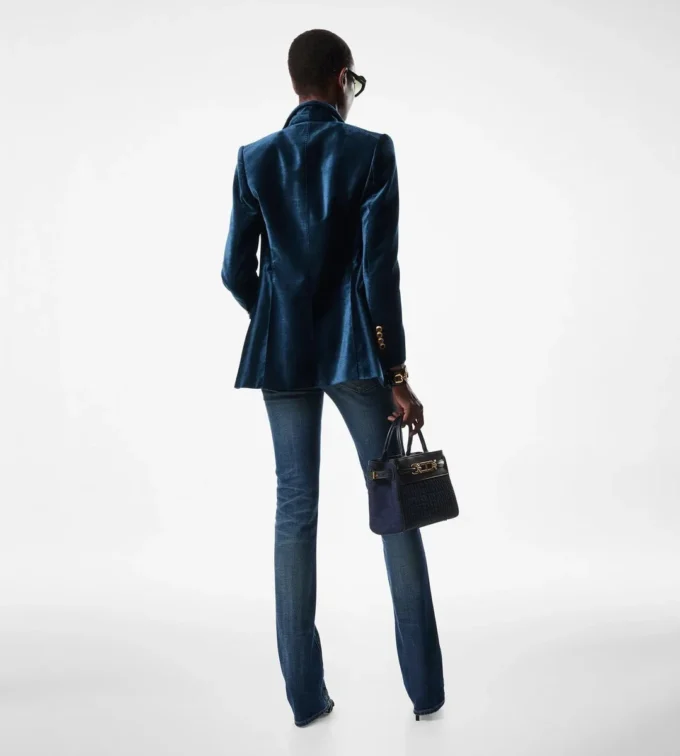 Pantaloni svasati in denim grezzo elasticizzato Pantaloni svasati in denim grezzo elasticizzato