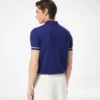Polo in cashmere e seta con bordino a contrasto