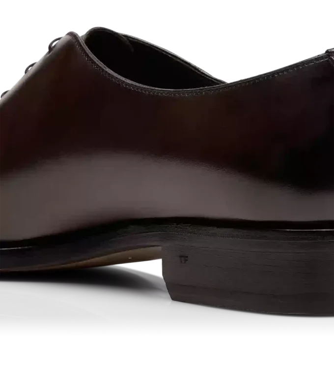 Scarpe stringate in pelle brunita